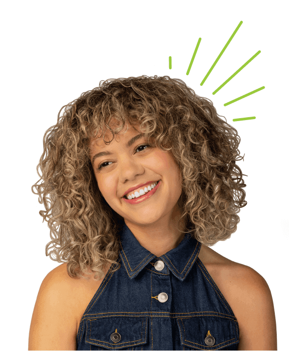 Smiling woman with voluminous, shoulder-length blonde curls wearing a sleeveless denim top, with bright green accent lines radiating behind her hair.
